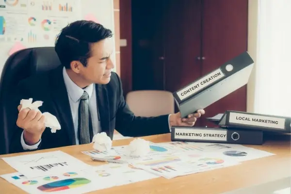 frustrated small business owner needing help with local content marketing